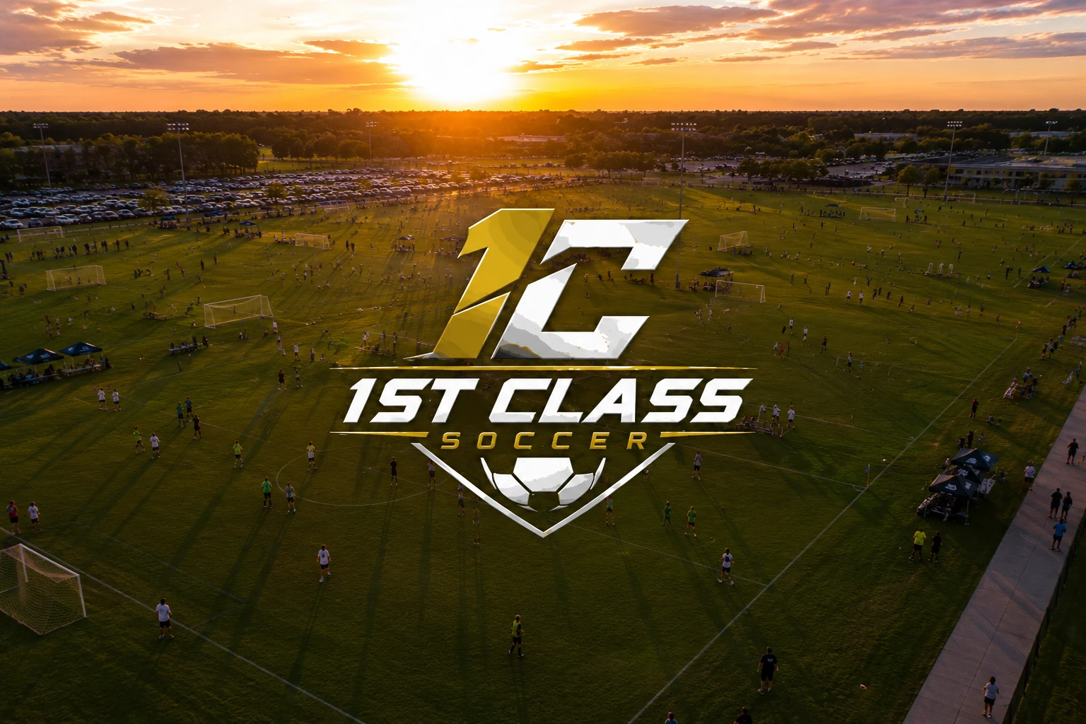 An aerial view of children playing soccer on a grass field