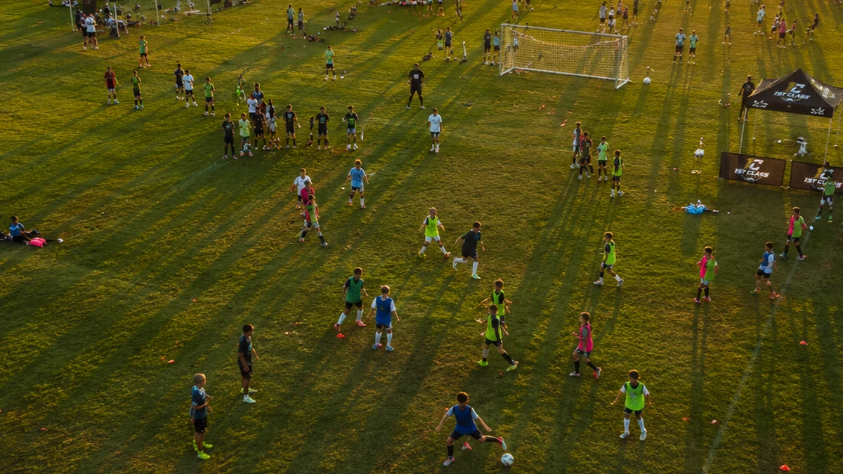 An aerial view of a large outdoor youth soccer event